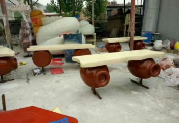 坐凳雕塑廠家，公園彩繪景觀雕塑擺件